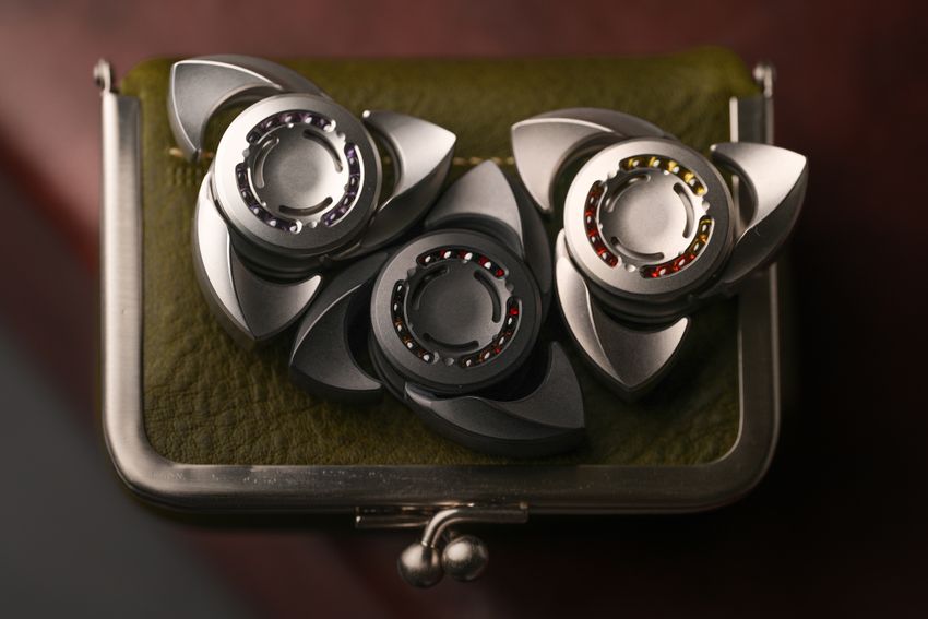 Three metal fidget spinners