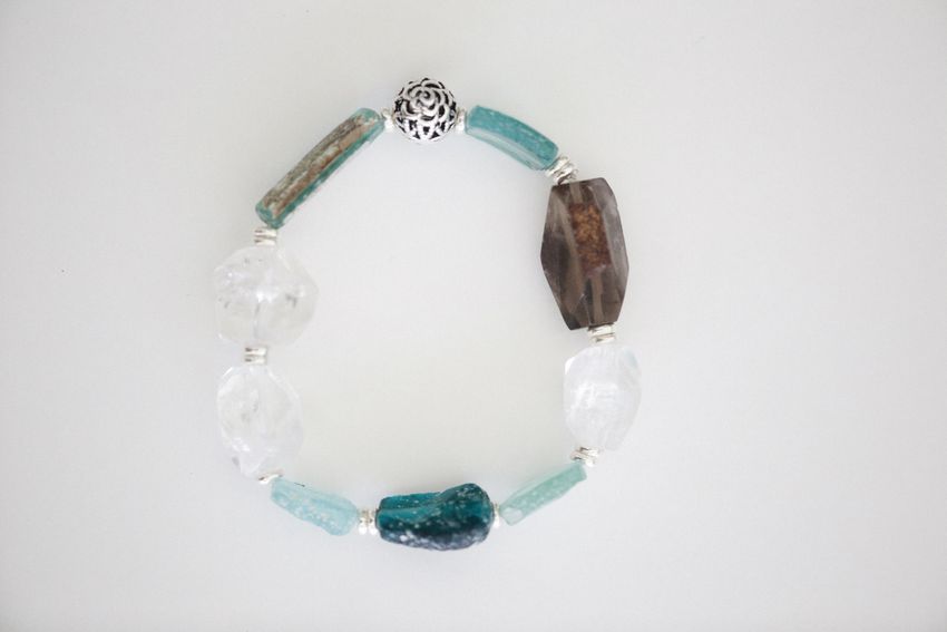 A gemstone bead bracelet on white